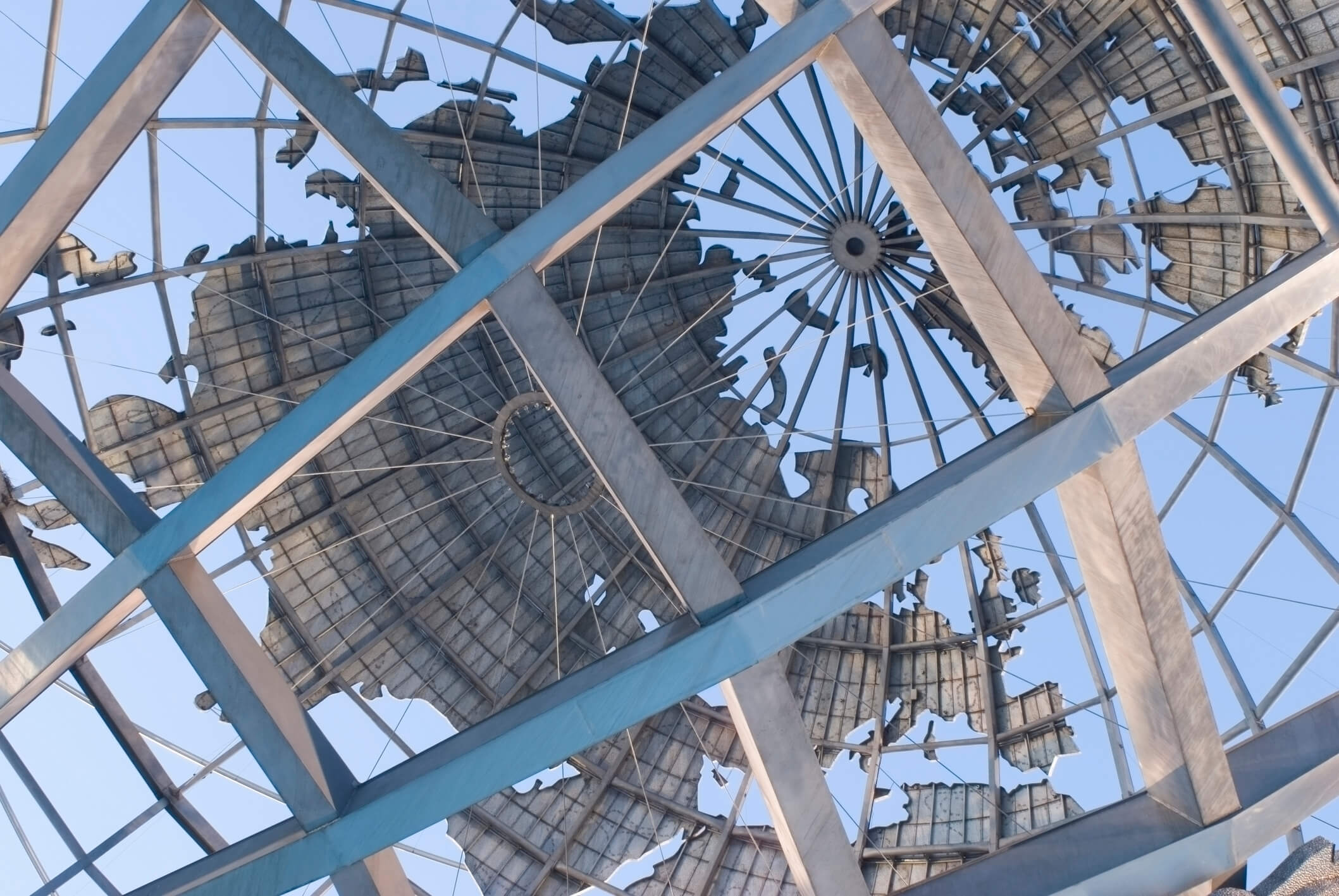 Landmark Steel Globe Built for the 1964-65 World's Fair. View through the steel beams of the globe. Flushing Meadows Corona Park, Queens, New York City, New York State, USA