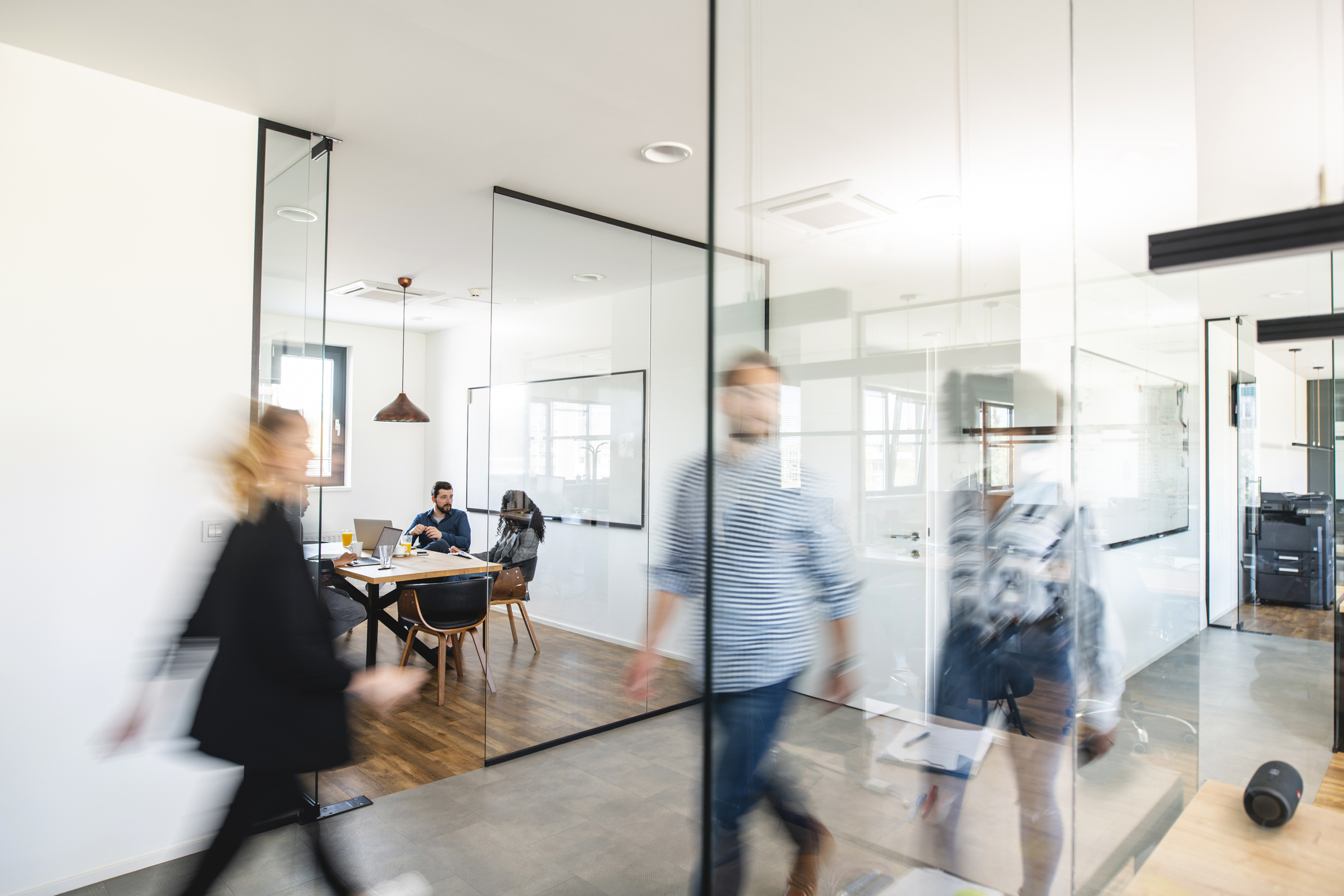 modern angular desk with workers, shot from above