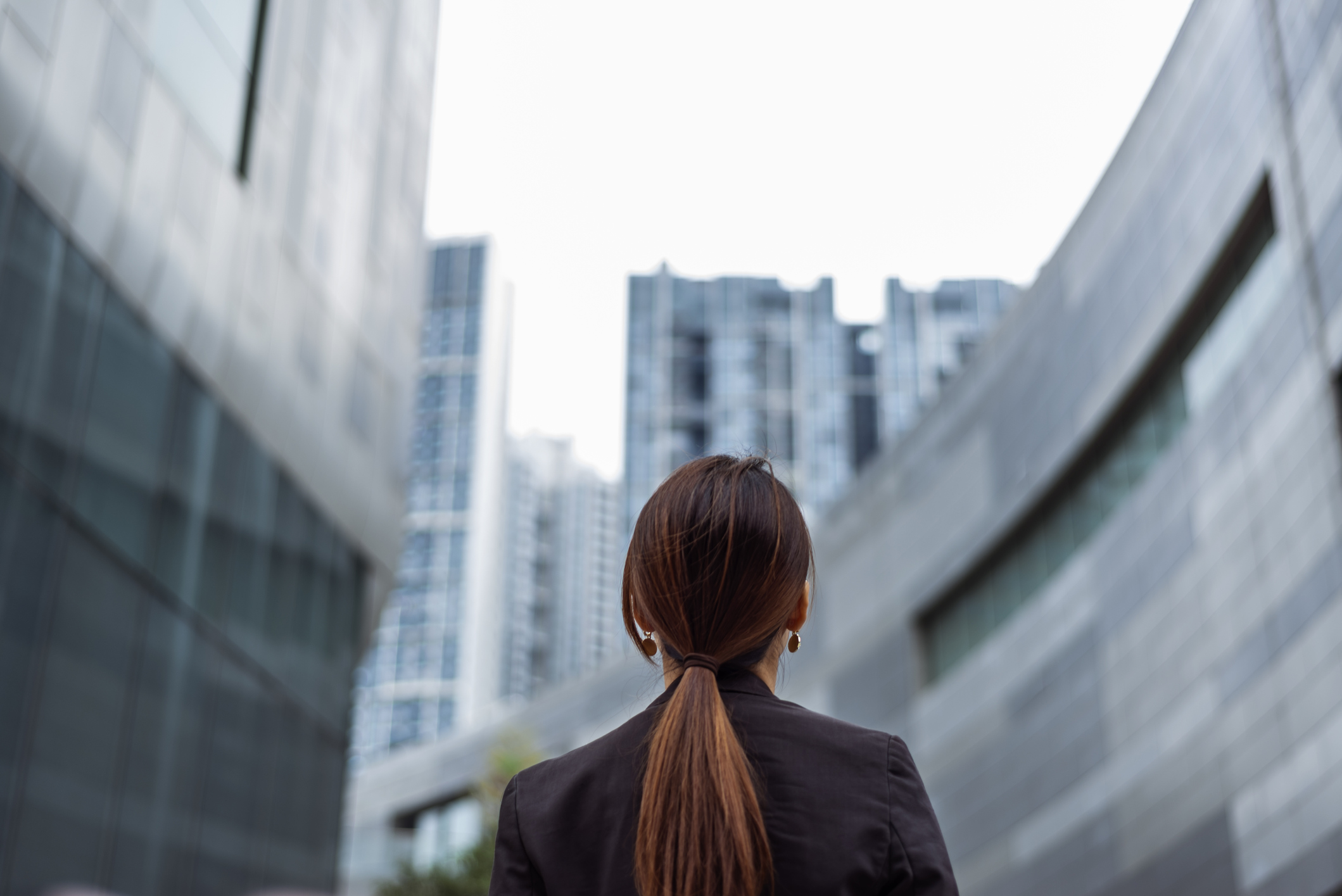 Rear view of Woman looking at city