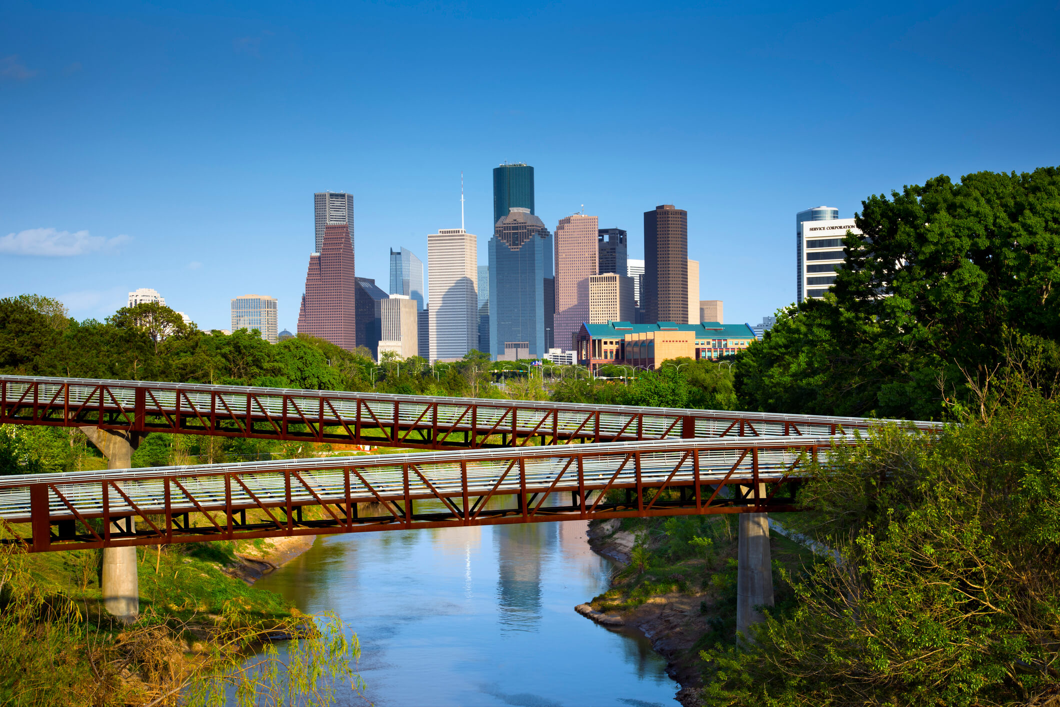 Urban Buffalo Bayou Park offers downtown Houston a green oasis for recreation. The Rosemont Pedestrian Bridges give pedestrians, bicyclists and joggers safe access across the Buffalo Bayou River and also beautiful views of the skyline.